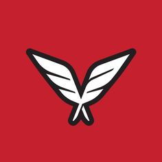 a red background with white wings on it