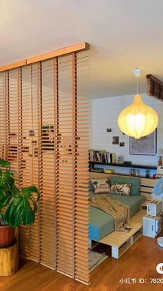 a living room with wooden slats on the wall