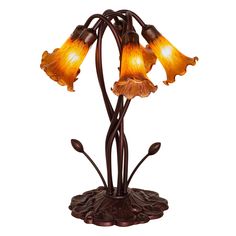 a lamp that is on top of a metal stand with flowers in the middle of it