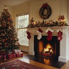 a living room decorated for christmas with stockings on the fire place and presents under the tree