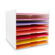 a multicolored file cabinet is shown on a white background with clippings