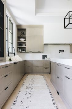 the kitchen is clean and ready for us to use in its new owner's home