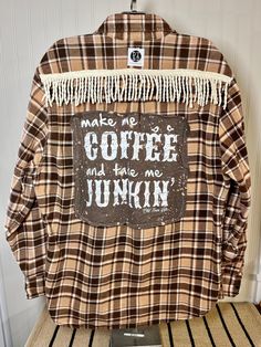 a plaid jacket with the words make me coffee and two more junkin'written on it