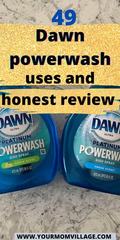 two bottles of dawn powerwash sitting on top of a counter