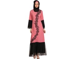 SAIDAH PINK CREPE ABAYA Item Details: Make a statement this season in this elegant dress, embellished with an intricate asymmetrical floral embroidery design across the bodice. -Round neckline. -Beautiful floral chain stitch embroidery work in front. -Contrast black colour panels at sleeves and bottom with gathered net top layering. -Utility pockets on both sides. -Matching Square Hijab (100*100 cm) and Band Included. Specifications: Colour: Black Fabric: Crepe (100% polyester) & Net (100% polye Traditional Pink Long Sleeve Abaya, Traditional Long Sleeve Pink Abaya, Pink Long Sleeve Abaya For Eid, Pink Embroidered Wedding Abaya, Festive Pink Long Sleeve Abaya, Pink Embroidered Long Sleeve Maxi Dress, Pink Long Sleeve Embroidered Maxi Dress, Crepe Abaya, Denim Abaya