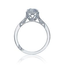 a diamond engagement ring on a white background