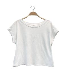 Introducing a 100% recycled cotton tee. Made from repurposed cotton and pre-washed for a natural vintage touch. The fit is super easy and comfy, ensuring a problem-free experience. Join us in embracing sustainable fashion! Content & Care: Composition: 100% recycled cotton Size: Small Medium Large Length 20 1/2" 21" 21 1/2" Inseam 20" 21" 22" Studio Ko Clothing They are a core minimal apparel wholesaler that supports customers that care for the planet. Their items are made in the USA and created Basic Washed Organic Cotton Tops, Everyday Washed Organic Cotton T-shirt, Relaxed White T-shirt With Soft-washed Detail, Relaxed Soft-washed White T-shirt, Eco-friendly Short Sleeve White Tops, Eco-friendly Cotton Tops For Everyday, White Organic Cotton Eco-friendly Tops, Eco-friendly White Short Sleeve Tops, White Eco-friendly Tops With Relaxed Fit