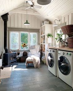 an instagram photo of a living room, kitchen and laundry room in one place