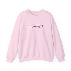 This women's crewneck sweatshirt with the quote 'I'm just a girl' exudes a casual and laid-back vibe, perfect for everyday wear. It is relevant to women who are looking for a cozy and stylish piece to add to their wardrobe. This sweatshirt is suitable for casual outings, lounging at home, or even as a thoughtful gift for birthdays or holidays. Product features - Knit in one piece without side seams for reduced fabric waste - Ribbed knit collar with seam for elasticity and shape retention - Medium-heavy fabric blend of 50% cotton and 50% polyester for coziness - Classic fit and crew neckline for comfort and style - Ethically made with 100% US cotton and low environmental impact dyes Care instructions - Machine wash: cold (max 30C or 90F) - Non-chlorine: bleach as needed - Tumble dry: low he Girls Fashion Tops, Sweatshirt Girl, Womens Crewneck, Fashion Top, Just A Girl, Girl Power, Crewneck Sweatshirt, Sweat Shirt