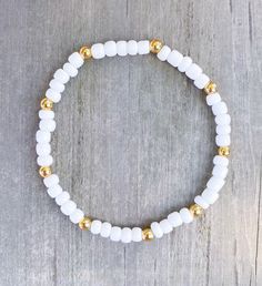 Wooden Mama Bracelet / Wood Mama Bracelet / Wood Beaded Bracelet / Natural Wood Beads / Natural Beaded Bracelet / Earthy Bracelet - Etsy White Friendship Bracelets With 8mm Beads, Gold Bracelets With 8mm Beads For Beach, White Spiritual Beaded Bracelets With Gold Beads, White Spiritual Beaded Bracelet With Gold Beads, Everyday White Beaded Rosary Bracelet, Minimalist White Bracelet With Gold Beads, White Rosary Bracelet With Colorful Beads, White Colorful Beaded Rosary Bracelet, White Bracelet With Gold Beads