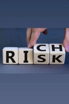 someone placing letters on top of each other that spell out the word,'ch risk '