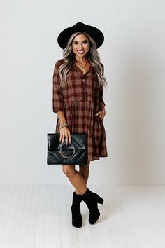 You will surely be in a cherry mood when you wear this charming tunic dress featuring lightweight material patterned with a brown and dark red hued plaid print, a v-cut neckline, loose 3/4-length sleeves, and a relaxed silhouette that falls into a straight mid-thigh length hemline! Measurements S : Bust 44", Hip 50", Length 33", Sleeve Length 15.5", Waist 44". M : Bust 46", Hip 52", Length 33.5", Sleeve Length 16", Waist 46". L : Bust 48", Hip 54", Length 34", Sleeve Length 16", Waist 48". XL : Plaid Tunic Dress, Plaid Tunic, Plaid Jacket, Model Fits, V Cut, V Cuts, Women Clothing Boutique, Plaid Print, Hip Length