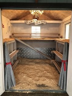 the inside of a horse trailer with hay in it