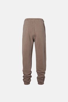 A staple in every wardrobe. The Core Sweatpant is made of 12 oz cotton with a vintage-inspired, baggy silhouette. Includes elasticized hem cuffs, drawstring waistband, and side pockets. Pair it with one of our Core sweatshirts to complete your matching lounge set. 100% ORGANIC COTTON 12 OZ BRUSHED TERRY STANDARD FIT HIGH RISE GARMENT WASHED Brown Relaxed Fit Bottoms For Leisure, Leisure Brown Cotton Pants, Brown Relaxed Fit Sweatpants For Loungewear, Brown Cotton Sporty Joggers, Brown Cotton Relaxed Fit Joggers, Brown Relaxed Fit Joggers For Loungewear, Oversized Cotton Bottoms With Drawstring, Brown Cotton Joggers For Loungewear, Sporty Brown Cotton Sweatpants