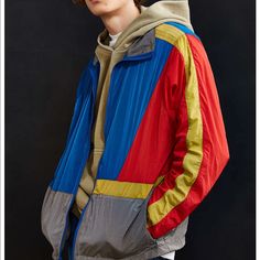 Brand New, With Tags, Never Been Used. This Is A Very Unique And Well Constructed Windbreaker. Full Zip Up. 2 Front Pockets. 1 Front “Hidden Pocket”. Adjustable Waistband. 100% Nylon Blue Outdoor Outerwear With Contrast Color, Retro Outerwear With Contrast Color For Spring, Sporty Red Outerwear With Patchwork, Sporty Red Patchwork Outerwear, Retro Color Block Long Sleeve Outerwear, Retro Long Sleeve Color Block Outerwear, Casual Spring Outerwear With Contrast Panels, Multicolor Patchwork Outerwear For Outdoor, Multicolor Long Sleeve Outerwear With Color Matching