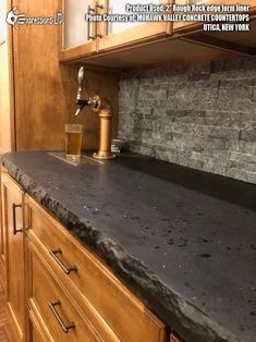 a kitchen counter top with a faucet on it