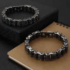 If you are adventurous enough to play with your style in wearing a piece of jewelry, then this edgy Bracelet by Innovato Design is perfect for you. It comes with a loud design that is excellent for those who seek out some fun in provocative creations. Made of 316L stainless steel, this amazing bracelet has an antique color that you will love to see every time you wear it, and you will love to flaunt it to your family and friends. It is in the form of a motorcycle chain link that is thick in desi Gunmetal Metal Chain Bracelet For Gift, Trendy Stainless Steel Box Chain Bracelet, Trendy Stainless Steel Box Chain Bracelets, Black Metal Box Chain Bracelets, Black Metal Bracelet With Box Chain, Trendy Black Metal Chain Bracelet, Black Punk Style Chain Bracelet As Gift, Punk Style Black Chain Bracelet Gift, Black Punk Style Chain Bracelet For Gift