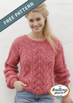 a woman wearing a pink knitted sweater with the words free pattern on it and an image of her hands in her pockets