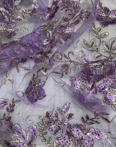 purple and silver sequins on sheer fabric with floral appliqued design