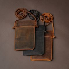 "Personalized Leather Slim Phone Pouch | Phone Shoulder Bag with Card Holder | iPhone 15, 14, 13 Case Gift | Handmade Phone Pouch with Strap  ⚠️REMINDER for PERSONALIZATION⚠️ If you do not specify a Design (Font or Logo) and Location for the personalization, your text will be engraved with Times New Roman BOLD (Like P-7 in the Design Image) on the Front Bottom Right / Corner of the product (Like Option 1 in the Personalization Locations image). Crafted at hand by the skilled artisans, this cross Leather Gifts For Him, Leather Pouch Phone Bag With Zipper, Large Capacity Leather Phone Pouch, Leather Phone Bag For On-the-go, Leather Phone Bag With Zipper Pocket For On-the-go, Leather Phone Pouch For On-the-go, Iphone Pouch, Crossbody Phone Purse, Leather Phone Pouch