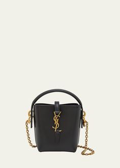 "Find SAINT LAURENT Le 37 Micro Ysl Leather Bucket Bag on Editorialist. Saint Laurent \"Le 37\" bucket bag in calfskin leather Top handle Detachable chain crossbody strap, 19.2\"L Can be worn as a top handle or crossbody bag Open top with center YSL logo strap Golden hardware Approx. 5.3\"H x 4.3\"W x 1.9\"D Made in Italy" Ysl Micro Bucket Bag, Luxury Handheld Bucket Bag For On-the-go, Ysl Bucket Bag, Luxury Bucket Bag With Adjustable Strap For On-the-go, Designer Black Bucket Bag With Gold-tone Hardware, Ysl Logo, Popular Bags, Leather Bucket, Leather Bucket Bag