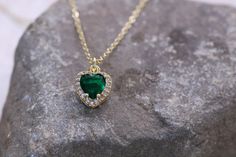 emerald green heart pendant necklace also available in magenta pink ,or rhinestone. Dainty minimalistic emerald green heart pendant charm necklace May birthstone necklace High quality 18k gold plated  With adjustable chain - Length option of 14'' to 16'' ,or 16'' to 18''  chain. Dainty minimalistic pendant charm. Great as a gift ,or for yourself for that special occasion! Any questions feel free to ask! Thanks for supporting a small family run business! Comes packaged in a beautiful box ready to Minimalistic Pendant, Green Heart Necklace, Necklace Love, Heart Choker, Green Heart, Heart Pendant Gold, Necklace Green, Gold Heart Necklace, Emerald Necklace