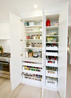 an open pantry with lots of food in it