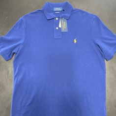 Polo Ralph Lauren Classic Fit Polo In Royal Blue. Blue Fitted Polo Shirt For Summer, Classic Fitted Blue Polo Shirt, Casual Blue Polo Collar T-shirt, Classic Light Blue Polo Collar Top, Fitted Light Blue Casual Polo Shirt, Blue Collared Polo Shirt For Spring, Blue Crew Neck Polo Shirt For Summer, Blue Fitted Cotton Polo Shirt, Blue Cotton Fitted Polo Shirt