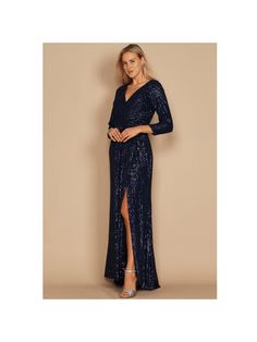 This elegant long sleeve dress has a deep V-neckline and a full back. In order to give it a sparkly appearance, sequined beads have been added. It is the ideal choice for significant occasions where you want to appear classy and clever while wearing something unusual due to the high slit that blends with the train and showcases the silhouette.






Fabric : Sequins

Length : Approximately 59 inches

Sleeve Style : Long Sleeve

Fully Lined

Occasion : Formal, Prom, Homecoming, Wedding Guest, Red Fitted V-neck Sequin Fabric For Evening, Long Sleeve Embellished Evening Dress For Dinner, V-neck Sequin Dress For Gala And Party Season, Dressy Long Sleeve Sequin Evening Dress, Formal V-neck Sequin Dress For Gala, Floor-length Evening Dress With Sequins For Dinner, Floor-length Sequined Evening Dress For Dinner, Sequined Floor-length Evening Dress For Dinner, Embellished V-neck Maxi Dress For Gala