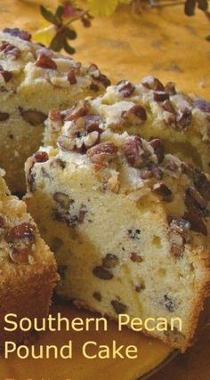 a close up of a cake on a plate with pecan and raisins