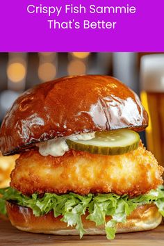 A close-up of a crispy fish sandwich with a glossy brioche bun, pickles, tartar sauce, and lettuce, placed on a wooden board. Text at the top reads "Crispy Fish Sammie That's Better." Cod Burger, Burger King Zesty Sauce, Beer Battered Cod, Battered Cod, Beer Burger, Easy Burgers, Sauce For Salmon, Fish Burger, Brioche Bun