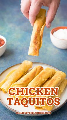 Holding one of the chicken taquitos over a stack of more taquitos. Stuffed Tacos, Rolled Tacos Recipe, Easy Chicken Taquitos, Rolled Chicken Tacos, Seasoned Shredded Chicken, Buffalo Chicken Fries