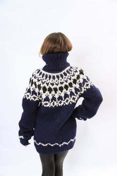 "Unisex Wool Handmade sweater with Nordic pattern DETAILS - Made from 100% natural soft wool - The model is 170 cm tall (regular S) - The sweater on picture is size L-XL with extended length - As mostly all models in our shop the sweater is loose fit - Color on photo - dark blue /jeans/ ,black ,cream with nordic pattern Details Sweater in the pictures : 1-Sweater Length80 cm/31.49'' 2-Sweater Chest50cm / 19.68'' 3-Sweater Sleeves55 cm /21.65 '' 4- Turtleneck Length- 28 cm / 11.02'' FIT The sweat High Neck Wool Sweater For Winter, Nordic Style Warm Sweater For Fall, Warm Nordic Sweater For Fall, Cozy Turtleneck Hand-knitted Cardigan, Cozy Turtleneck Hand Knitted Cardigan, Nordic Chunky Knit Sweater For Fall, Nordic Wool Sweater Hand Knitted, Nordic Style Long Sleeve Merino Wool Sweater, Nordic Style Hand Knitted Wool Sweater