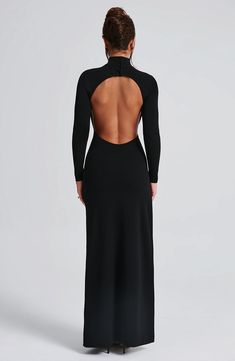 Say hello to Imelda, your new fave black dress to wear everywhere. This super sexy, versatile maxi is cut with sleek long sleeves, high neck and eye-catching low open back. It's finished with a thigh high split and boning for added structure. Style yours with black mule heels and a chic hair up. 



Colour: Black.

Premium stretch crepe fabric.

Fully lined. High neck with buttons on back neck.

Long fitted sleeves.

Boning on side for added structure.

Moulds to figure with bodycon fit.

Thigh Long Sleeve Dress Open Back, Long Sleek Dress, Low Cut Backless Dress, Backless Dress Long Sleeve, Black High Neck Dress, Black Dress With Open Back, Bare Back Dress, High Neck Black Dress, Homecoming Dresses Corset