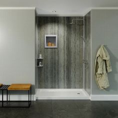 a bathroom with a walk in shower next to a bench