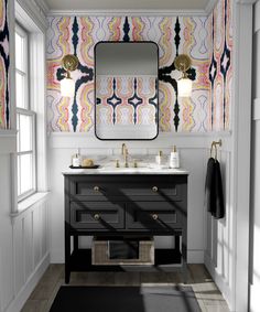 a bathroom with a sink, mirror and rug