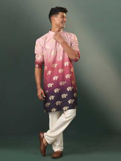 VASTRAMAY Men's Ombre Elephant Motif Print Cotton Blend Kurta Pyjama Set Upgrade your ethnic wear collection with this stylish kurta pyjama set by VASTRAmay. It features a comfortable cotton blend fabric, ombre print with elephant motifs, and a classic design. Key Features Ombre elephant motif print Cotton blend fabric for comfort Mandarin collar kurta with side slits Cream viscose pyjama with elasticated waistband Specifications Material:Cotton Blend Care Instructions: Dry Clean Material & Care Pink Kurta With Pallu For Navratri, Pink Dabka Sherwani For Festivals, Festival Pink Sherwani With Dabka, Pink Long Sleeve Sherwani With Dabka, Pink Long Sleeve Traditional Wear For Eid, Pink Long Sleeve Sets For Diwali, Pink Kurta With Dabka Detailing, Traditional Pink Kurta For Eid, Unstitched Pink Kurta For Diwali