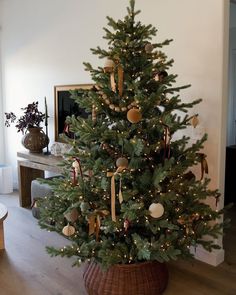 a decorated christmas tree in a living room