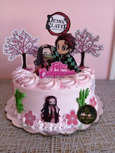 a pink cake with an anime character on it