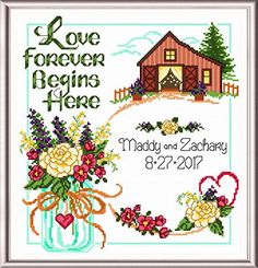 a cross stitch pattern with flowers in a vase and a barn on the other side