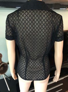 For Sale on 1stDibs - Dolce & Gabbana Vintage Sheer Mesh Lace Eyelet Button-Up Black Top Shirt Size S Dolce & Gabbana sheer stretchy lace mesh eyelet black top with pointed Formal Sheer Stretch Tops, Formal Fitted Short Sleeve Lace Top, Formal Fitted Lace Top With Short Sleeves, Fitted Lace Top With Short Sleeves For Evening, Elegant Fitted Lace Mesh Top, Fitted Lace Top With Short Sleeves For Night Out, Elegant Sheer Short Sleeve Mesh Top, Elegant Short Sleeve Mesh Top For Night Out, Fitted Short Sleeve Lace Top For Night Out