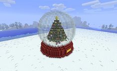 a snow globe with a christmas tree inside