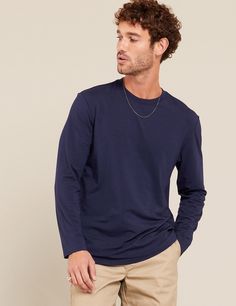 Every capsule wardrobe deserves the essential comfort and style that a high-quality, comfy long sleeve t-shirt provides. With its relaxed-fit silhouette, classic neckline, and long cuffed sleeves, this fit is a reliable everyday essential. Style it according to your destination—whether tucked in for a polished look or left out for casual everyday. Basic Long Sleeve Tee, Fast Fashion Brands, Basic Long Sleeve, Sporty Look, Casual Everyday, Polished Look, Cuff Sleeves, Fast Fashion, Capsule Wardrobe