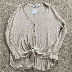 Super Soft And Comfortable. Popular Style From Urban Outfitters. Can Be Worn Ties Or Untied. Oatmeal Heather Color. Size Small. Brand New With Tags Casual Oatmeal Tops For Summer, Casual Oatmeal Summer Tops, Urban Outfitters Beige Long Sleeve Tops, Beige Long Sleeve Top From Urban Outfitters, Oatmeal Long Sleeve Top For Spring, Casual Taupe Tops For Day Out, Oatmeal Tops For Everyday Spring Wear, Oatmeal Tops For Spring Everyday Wear, Casual Taupe Tops For Spring