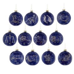 twelve blue glass baubles with zodiac signs