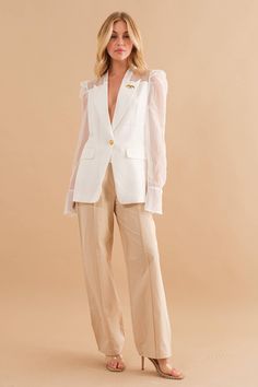 A gorgeous twist on a fun staple piece. Our Cherie Organza Puff Blazer features sheer sleeves with beautiful tailoring, flute sleeve and gold button and pin detail. Slim fit. 100% polyester Fashion Library, Flute Sleeve, Jordan Jackets, Blazer And Shorts, Fashion Board, Sheer Sleeves, Staple Pieces, Gold Buttons, Style Board