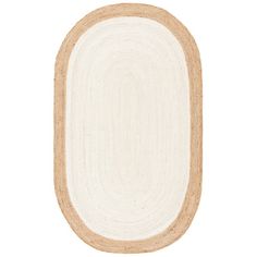 the oval rug is made from jute and has a beige border on top of it