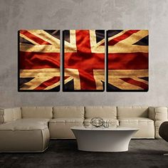 three pieces of art depicting the flag of great britain on a wall in a living room