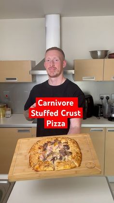 a man holding a pizza on a cutting board with the words carnivor stuffed crust pizza