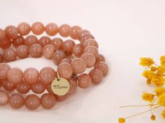 "Looking for the perfect personalized gift for her? Look no further than this stunning sunstone bracelet! Crafted with the finest quality sunstones, this bracelet can be custom engraved with a name, date, or short message. Show someone you care with this beautiful and unique piece of handmade jewelry.  ❤️ ENGRAVING INSTRUCTIONS ❤️ Get a sneak peek of your custom bracelet design before it's engraved! After you place your order, we'll send you a digital preview of your personalized engraving. We want you to be absolutely thrilled with your bracelet, so if you want to make any changes, just let us know! 🎁 PACKAGING & WRAPPING 🎁 We treat your personalized bracelet with special care. It will be beautifully arranged in a stunning gift box and wrapped with great attention to detail. That way, i Natural Stones Bracelets For Mother's Day, Natural Stone Bracelets For Mother's Day Gifts, Mother's Day Gift Bracelets With Natural Stones, Round Bead Birthstone Bracelets For Gifts, Birthstone Bracelets With Round Beads For Gifts, Gift Birthstone Bracelets With Round Beads, Round Beaded Birthstone Bracelets For Gifts, Round Beads Birthstone Bracelets For Gifts, Rose Gold Bracelets With 8mm Beads For Gift